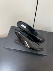 ALAIA WEDGE MULES 25S IN BLACK LAMBSKIN