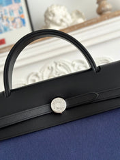 ZIP CABINE 31 BAG IN NAVY BLUE CANVAS AND BLACK CALFSKIN