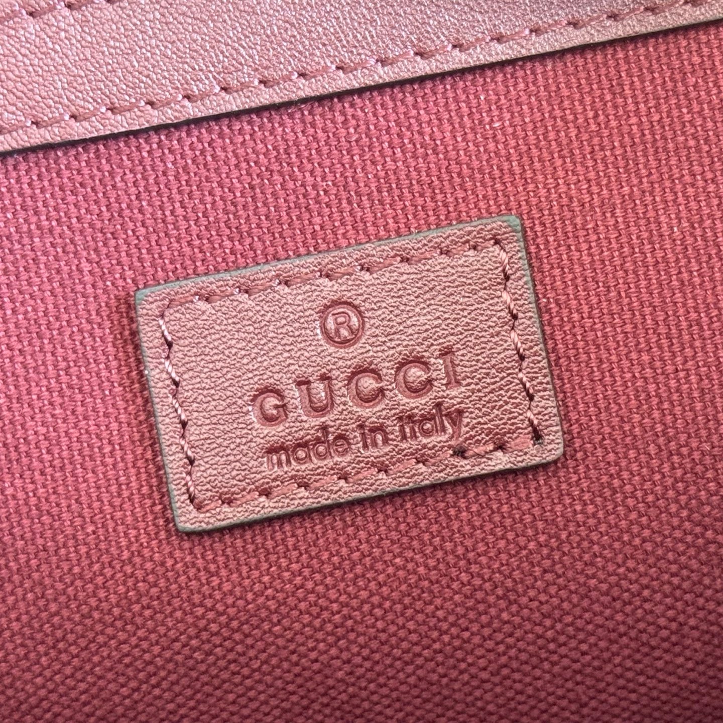 GUCCI 26S GG EMBLEM BUCKET BAG 25 IN DARK RED COATED FABRIC