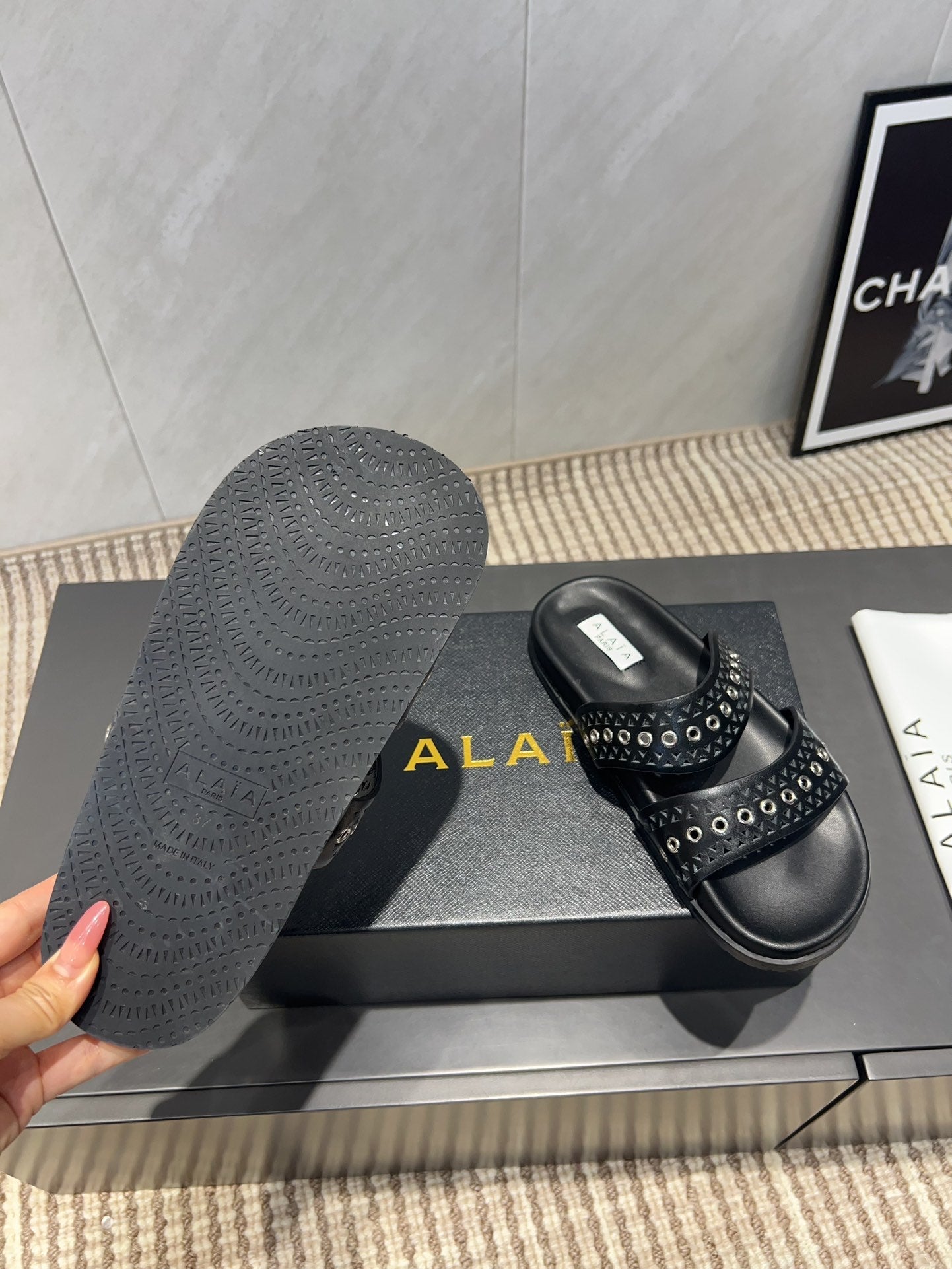 ALAIA DOUBLE-STRAP SANDALS 25S IN BLACK CALFSKIN