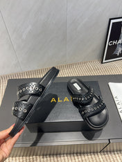 ALAIA DOUBLE-STRAP SANDALS 25S IN BLACK CALFSKIN