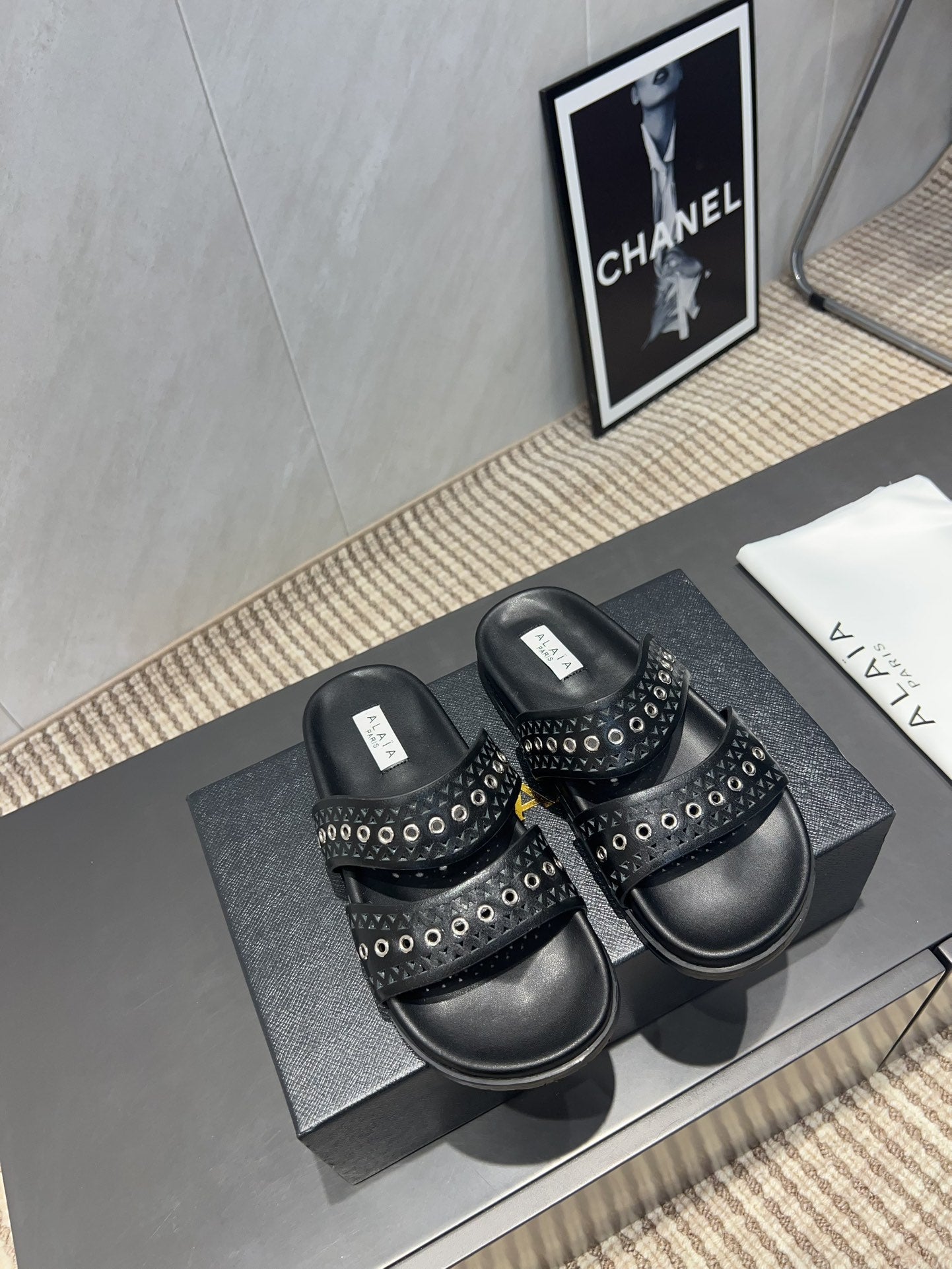 ALAIA DOUBLE-STRAP SANDALS 25S IN BLACK CALFSKIN