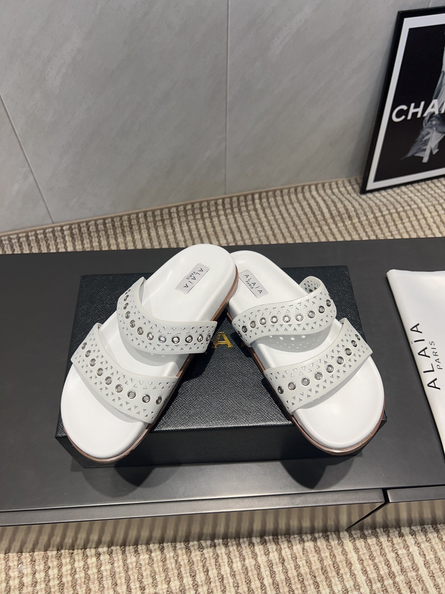 ALAIA DOUBLE-STRAP SANDALS 25S IN WHITE CALFSKIN