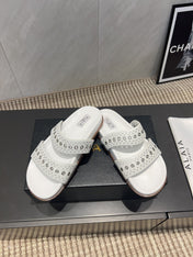 ALAIA DOUBLE-STRAP SANDALS 25S IN WHITE CALFSKIN