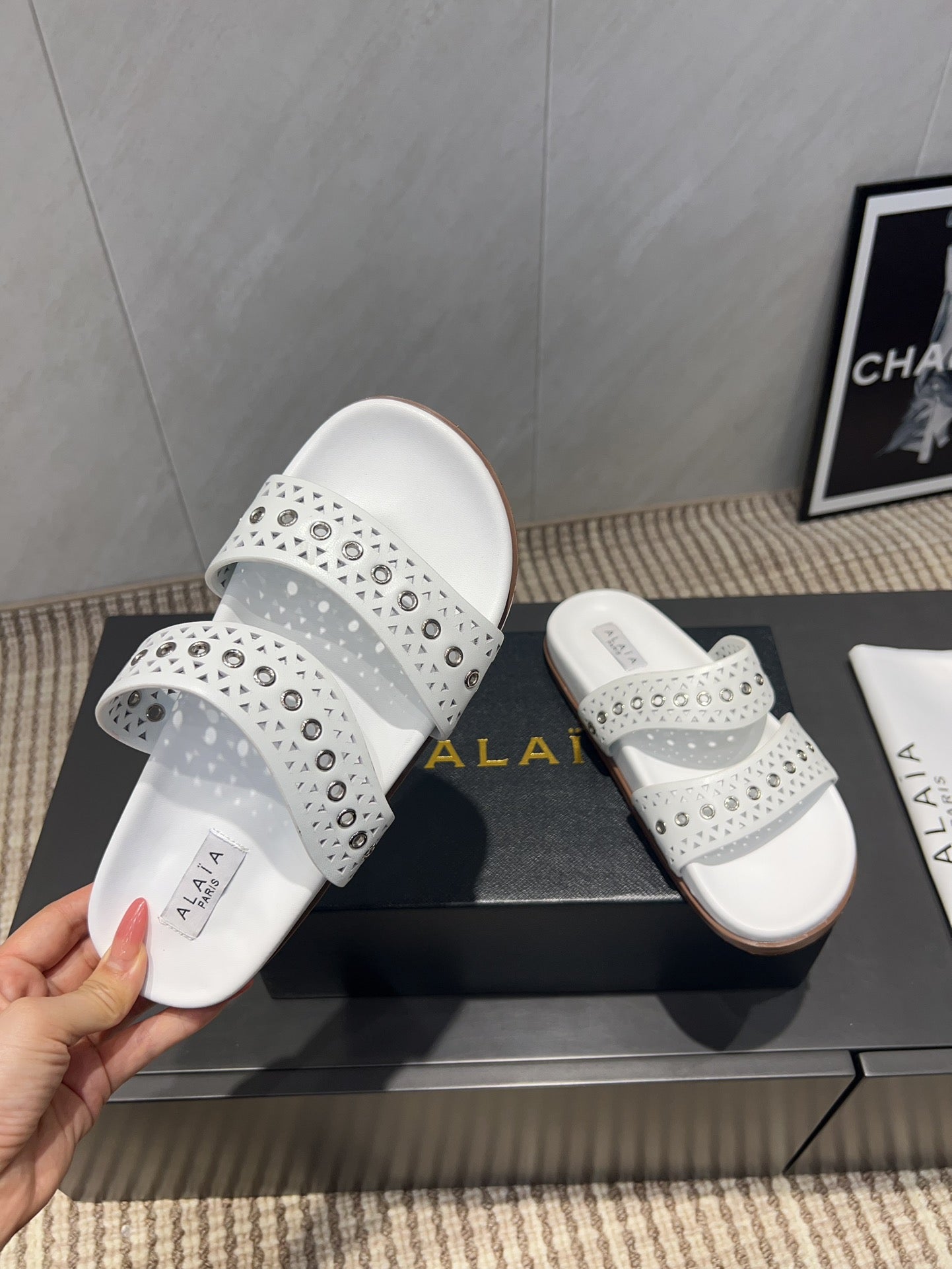 ALAIA DOUBLE-STRAP SANDALS 25S IN WHITE CALFSKIN