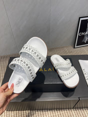 ALAIA DOUBLE-STRAP SANDALS 25S IN WHITE CALFSKIN