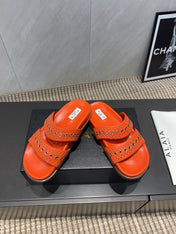 ALAIA DOUBLE-STRAP SANDALS 25S IN ORANGE CALFSKIN
