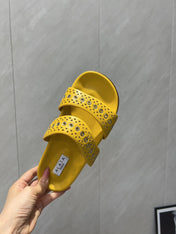 ALAIA DOUBLE-STRAP SANDALS 25S IN YELLOW CALFSKIN