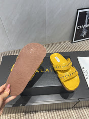 ALAIA DOUBLE-STRAP SANDALS 25S IN YELLOW CALFSKIN