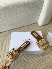 ALAIA FLAT MULE IN BEIGE CREAM SUEDE