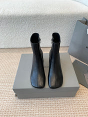 ANKLE BOOTS IN BLACK LOGO EMBOSSED SOFT SHEEPSKIN