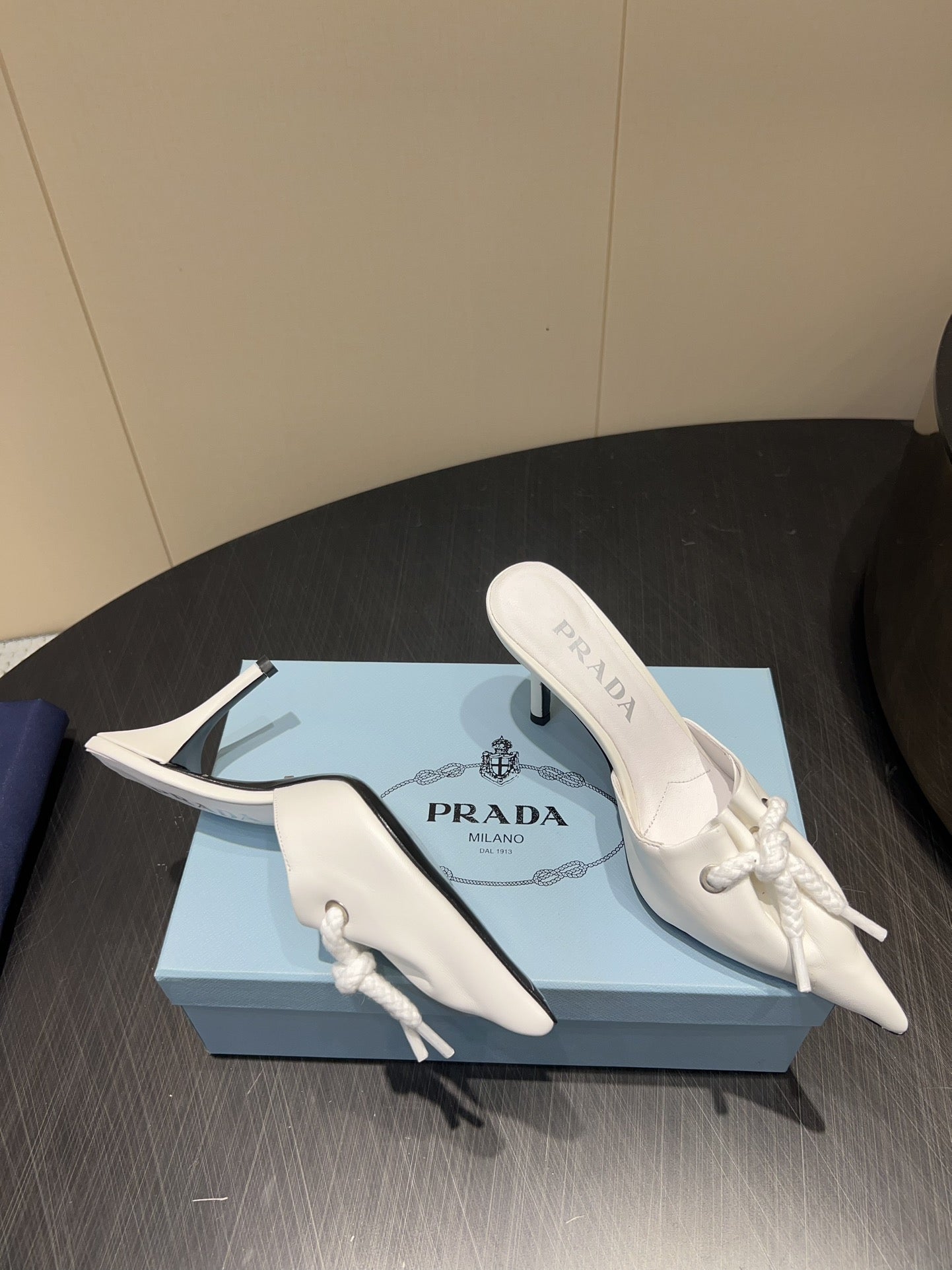 PRADA 25S BRAIDED DETAIL MULES 85MM IN WHITE CALFSKIN