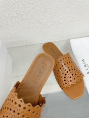 ALAIA VIENNE FLAT MULES IN CHOCOLATE BROWN LAMBSKIN