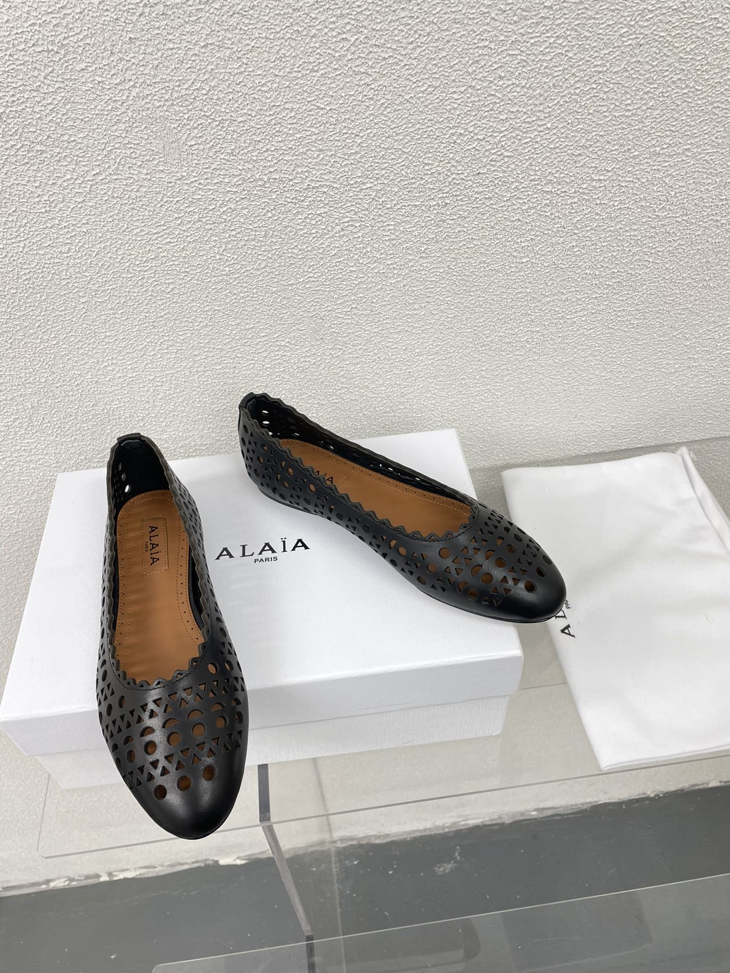 ALAIA BALLET FLAT IN BLACK MESH LAMBSKIN