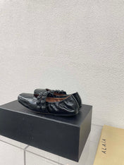 ALAIA MARY JANE PEARL IN GLOSSY BLACK LAMBSKIN