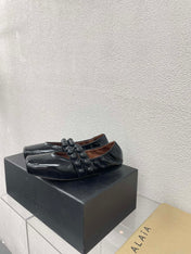 ALAIA MARY JANE PEARL IN GLOSSY BLACK LAMBSKIN