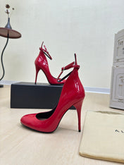 DECOLLETE PUMPS IN CHERRY RED PATENT CALFSKIN