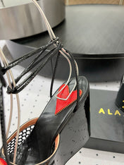 ALAIA BANQUET WEDGE SANDALS IN BLACK LAMBSKIN WITH RED HEART