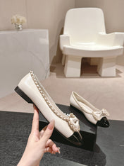 BOWKNOT BALLET FLAT IN WHITE MIX BLACK SHEEPSKIN