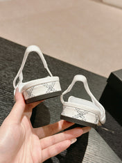 SLINGBACKS IN WHITE LAMBSKIN AND BLACK SATIN