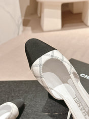 SLINGBACKS IN WHITE LAMBSKIN AND BLACK SATIN