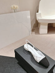 SLINGBACKS IN WHITE LAMBSKIN AND BLACK SATIN