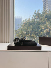 ALAIA 26S FLATS IN BLACK PONY HAIR WITH SILVER STUD STRAP