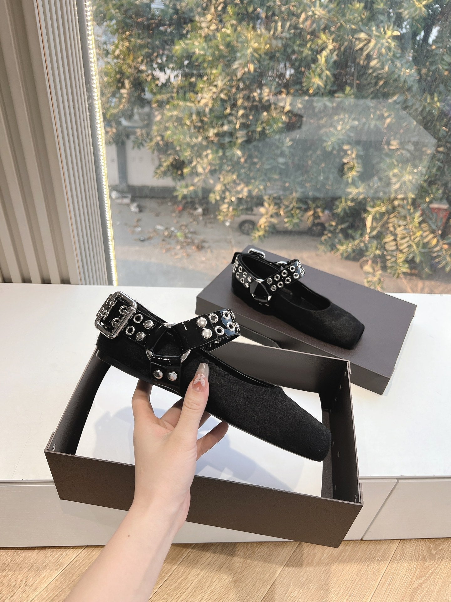 ALAIA 26S FLATS IN BLACK PONY HAIR WITH SILVER STUD STRAP