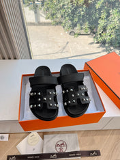 CHYPRE SANDAL IN BLACK CALFSKIN WITH STUDS