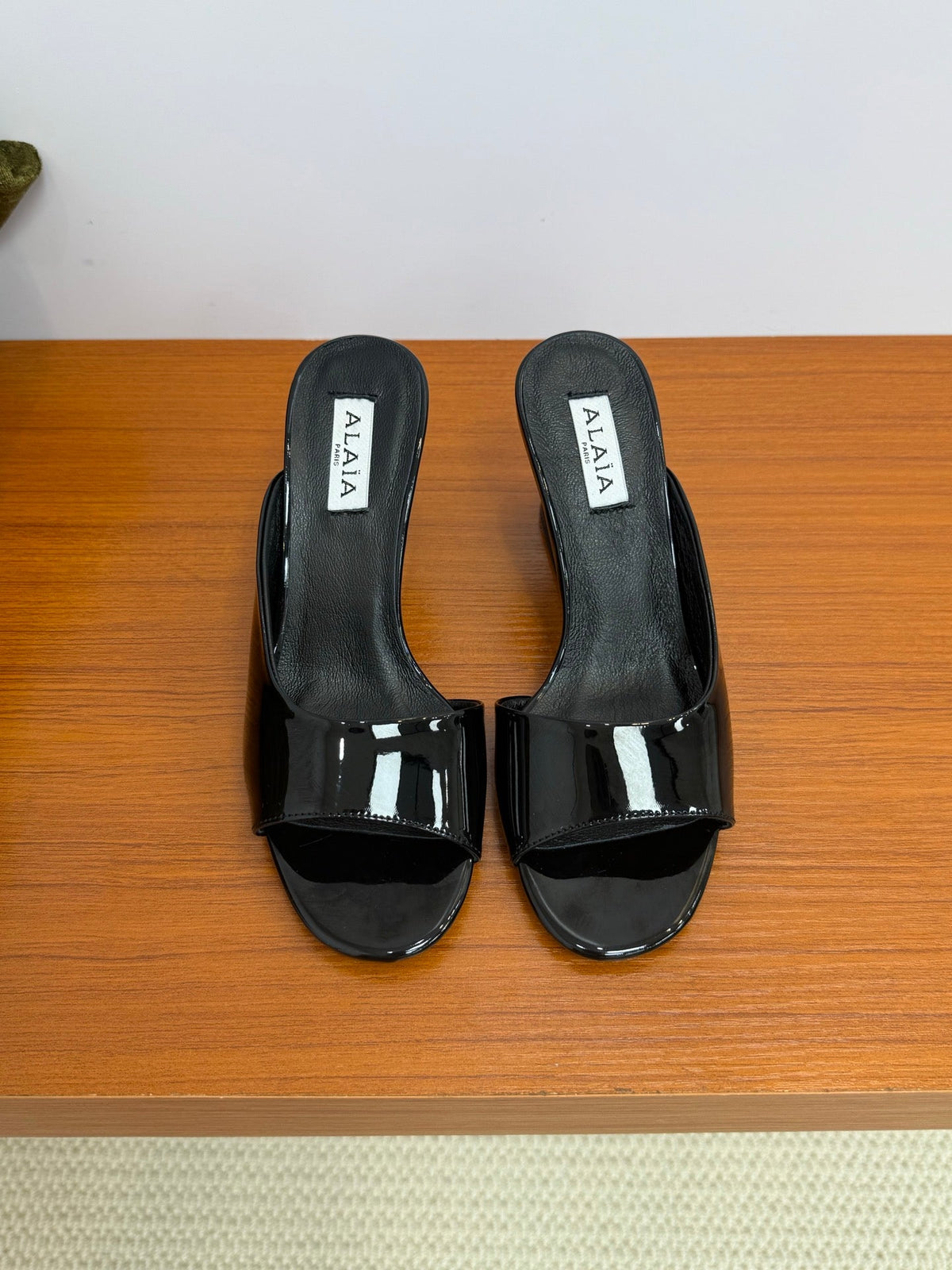 ALAIA WEDGE SANDALS 25S IN BLACK LAMBSKIN