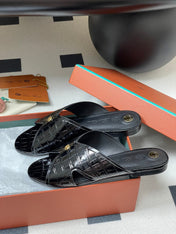 FLAT SLIPPERS IN BLACK CALFSKIN SNAKE EMBOSSING