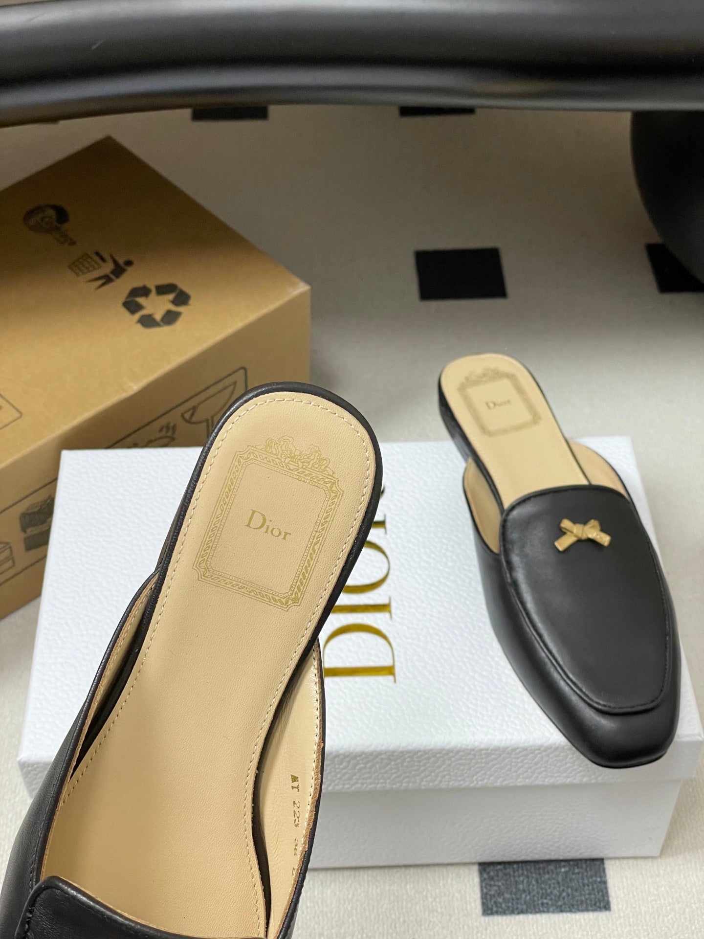 DIOR 26S MULES IN BLACK CALFSKIN WITH BOW