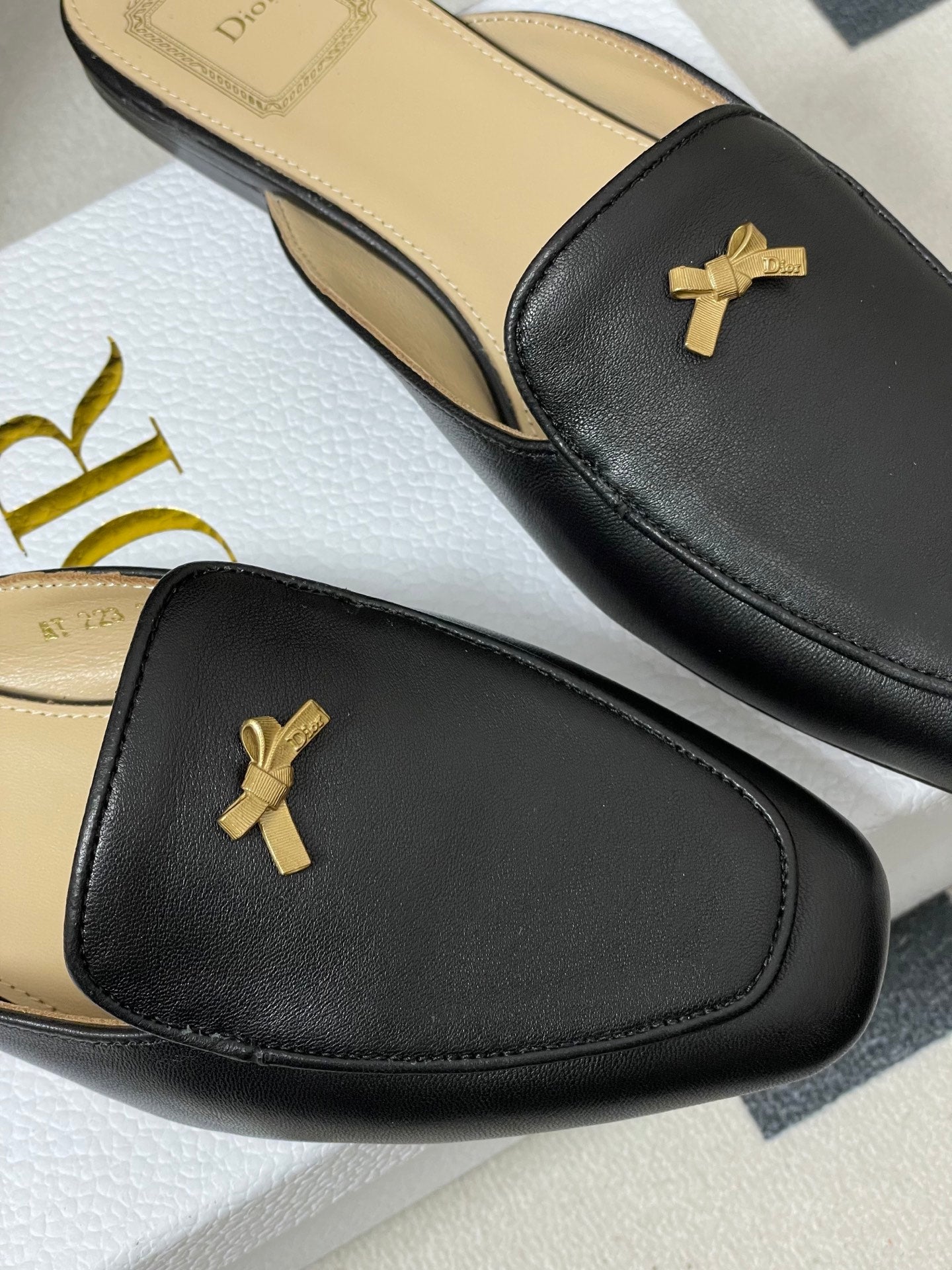 DIOR 26S MULES IN BLACK CALFSKIN WITH BOW