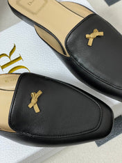 DIOR 26S MULES IN BLACK CALFSKIN WITH BOW