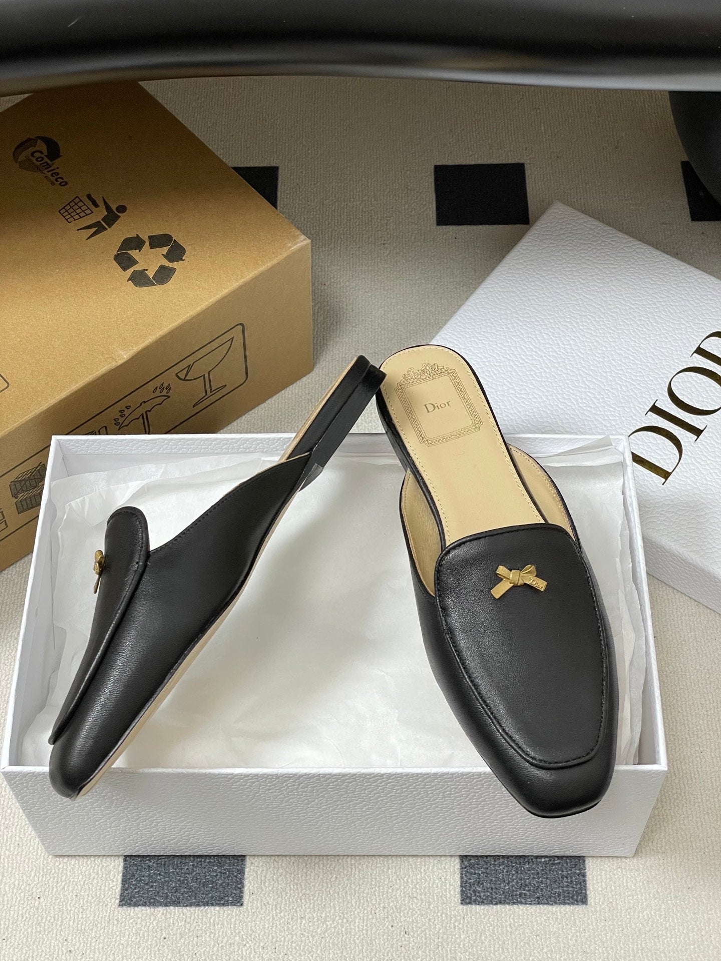 DIOR 26S MULES IN BLACK CALFSKIN WITH BOW