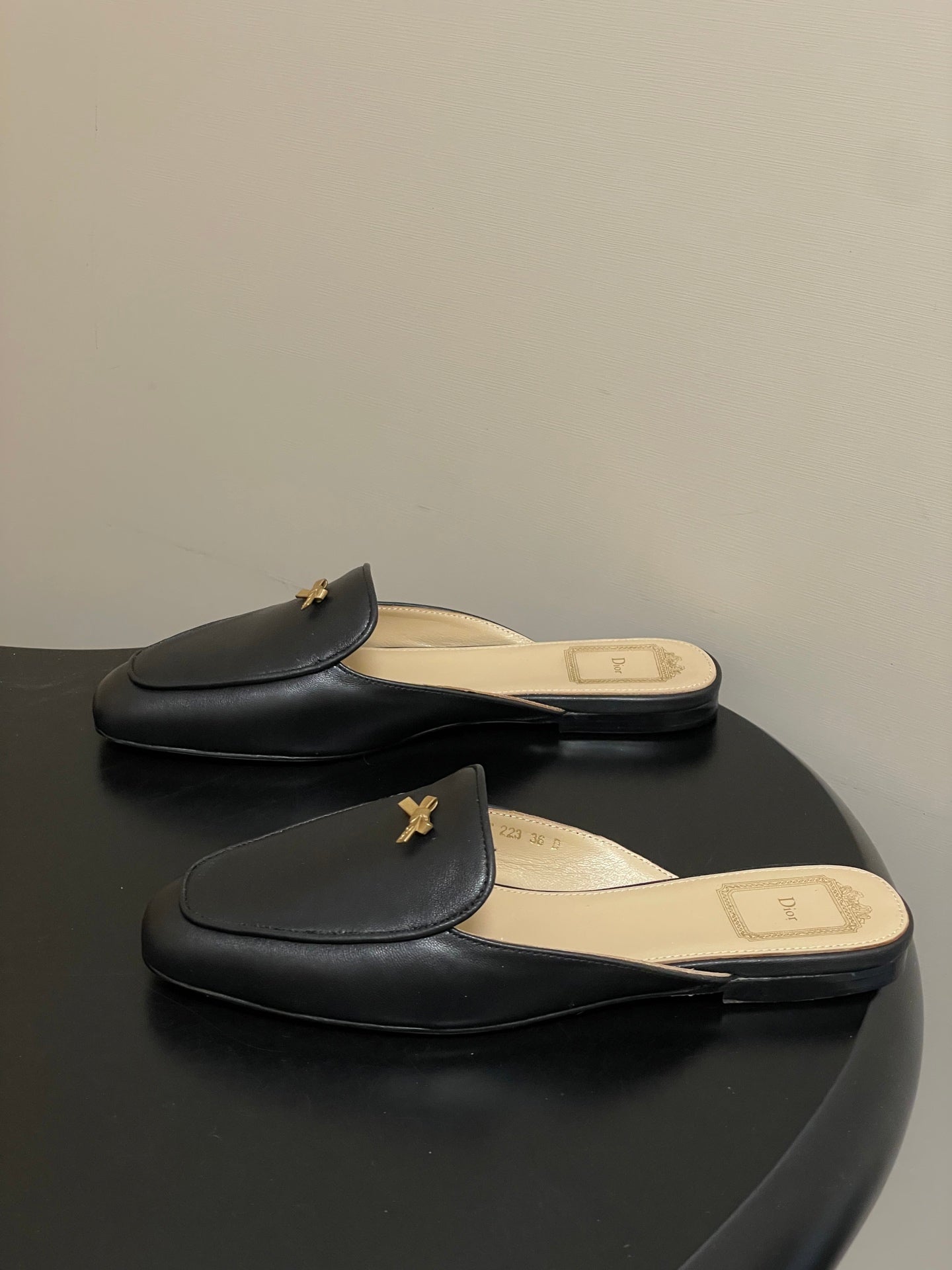 DIOR 26S MULES IN BLACK CALFSKIN WITH BOW