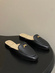 DIOR 26S MULES IN BLACK CALFSKIN WITH BOW