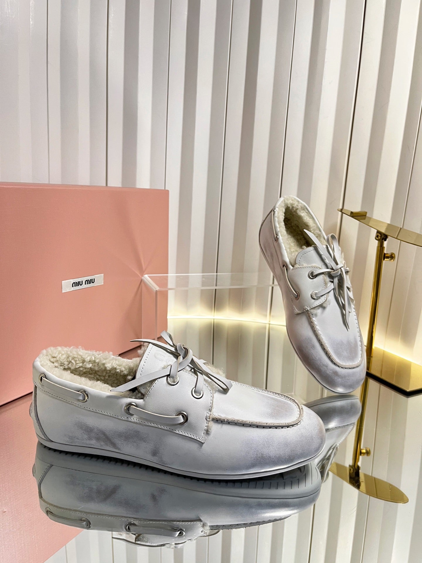 MIUMIU 26S FUR BOAT SHOES IN LIGHT GRAY CALFSKIN