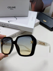 TRIOMPHE SUNGLASSES 548593 IN BLACK AND WHITE ACETATE