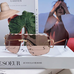 C DE RIMLESS NAVIGATOR FRAME SUNGLASSES 548665 IN METAL