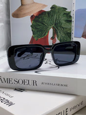 MONTAIGNE SUNGLASS 571596 IN BLACK ACETATE TEXT LOGO