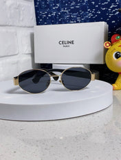 TRIOMPHE SUNGLASS 538532 IN BLACK ACETATE GOLD METAL