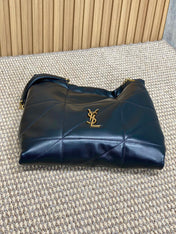 DRAWSTRING CHAIN STRAP SHOULDER BAG 39 IN BLACK QUILTED CALFSKIN