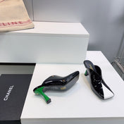 CHANEL 26S HIGH-HEEL MULES 70 MM IN BLACK AND WHITE LAMBSKIN