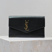 UPTOWN WALLET 21 IN BLACK CALFSKIN GOLD LOGO