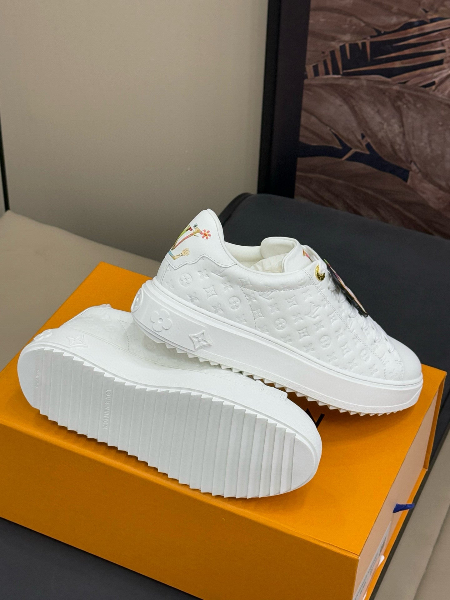 TIME OUT SNEAKER IN WHITE EMBOSSED MONOGRAM CALFSKIN