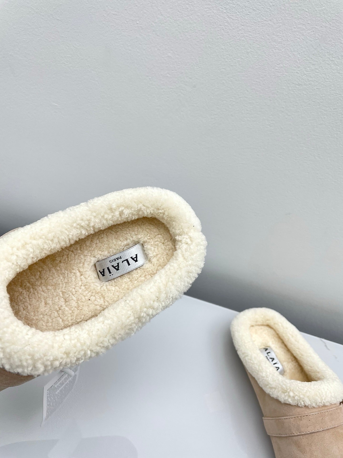 ALAIA 26S MULE IN BEIGE SUEDE AND WOOL