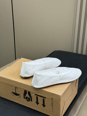 ALAIA FISHNET MESH BALLET FLATS 25S IN WHITE FABRIC