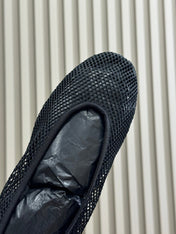 ALAIA FISHNET MESH BALLET FLATS 25S IN BLACK FABRIC