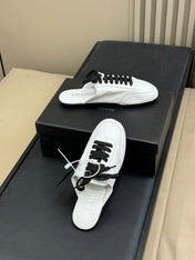 PRADA 25S COLLAPSE MULES IN WHITE CALFSKIN